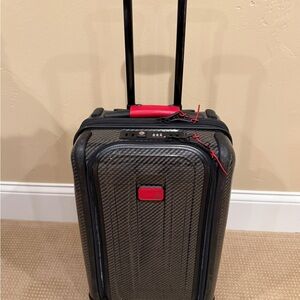 Tumi Black and Gray Rolling Suitcase